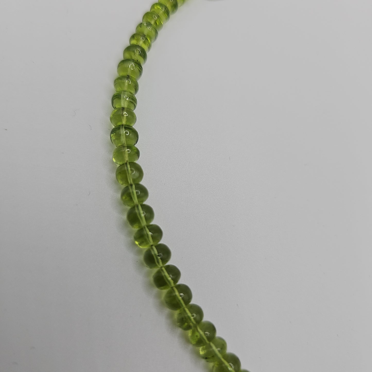 Peridotkette Linsen