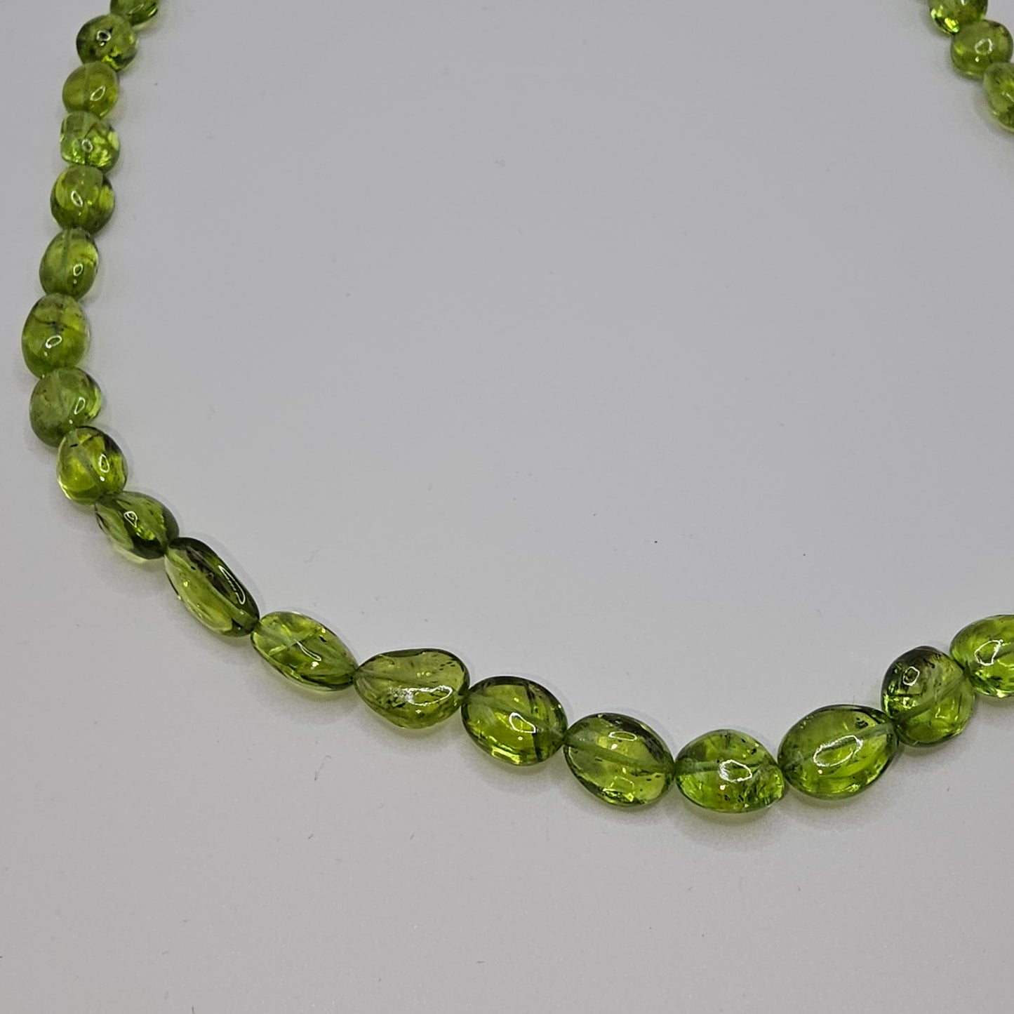 Peridotkette Boutons