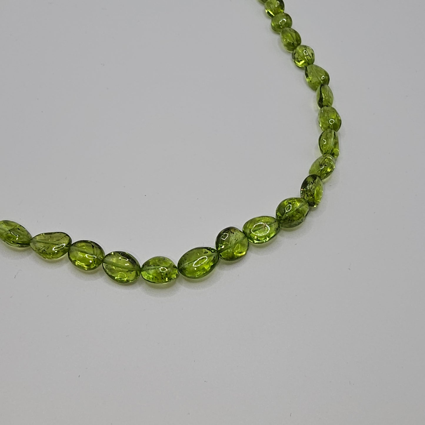 Peridotkette Boutons