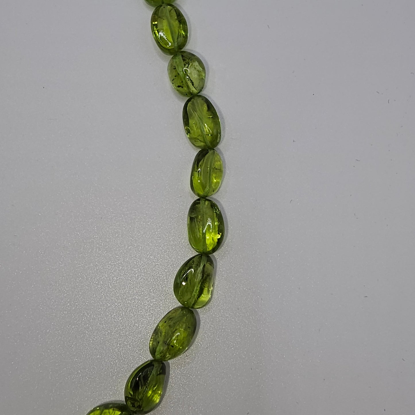 Peridotkette Boutons